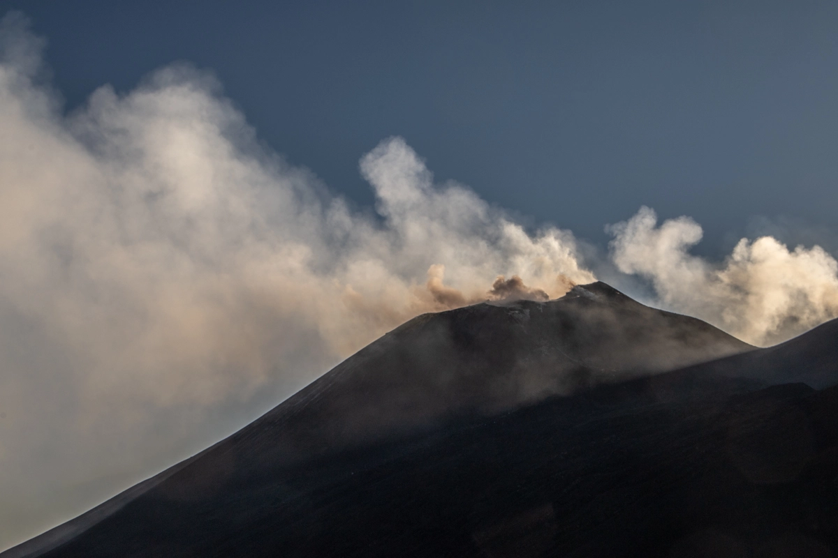 mount etna south summit crater emitting smoke