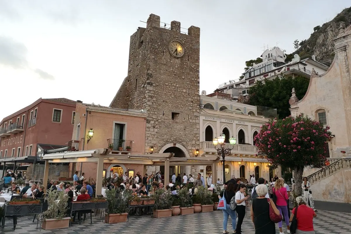 what to do in taormina piazza 25 aprile clock tower